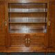 Bibliothèque-armoire Art Nouveau en noyer burr et chêne par Léon Jallot
