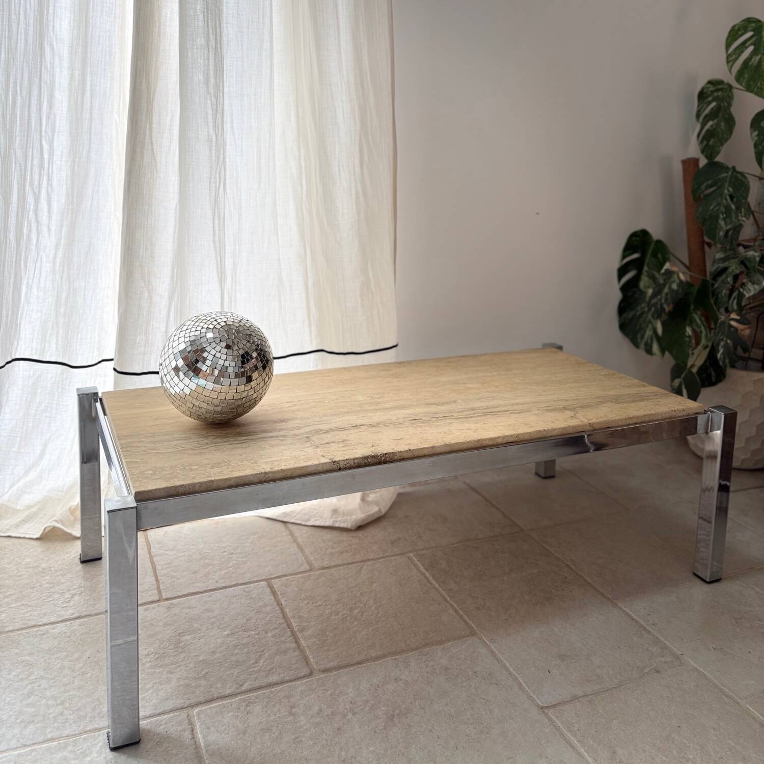 Chrome metal and travertine coffee table, 1970.