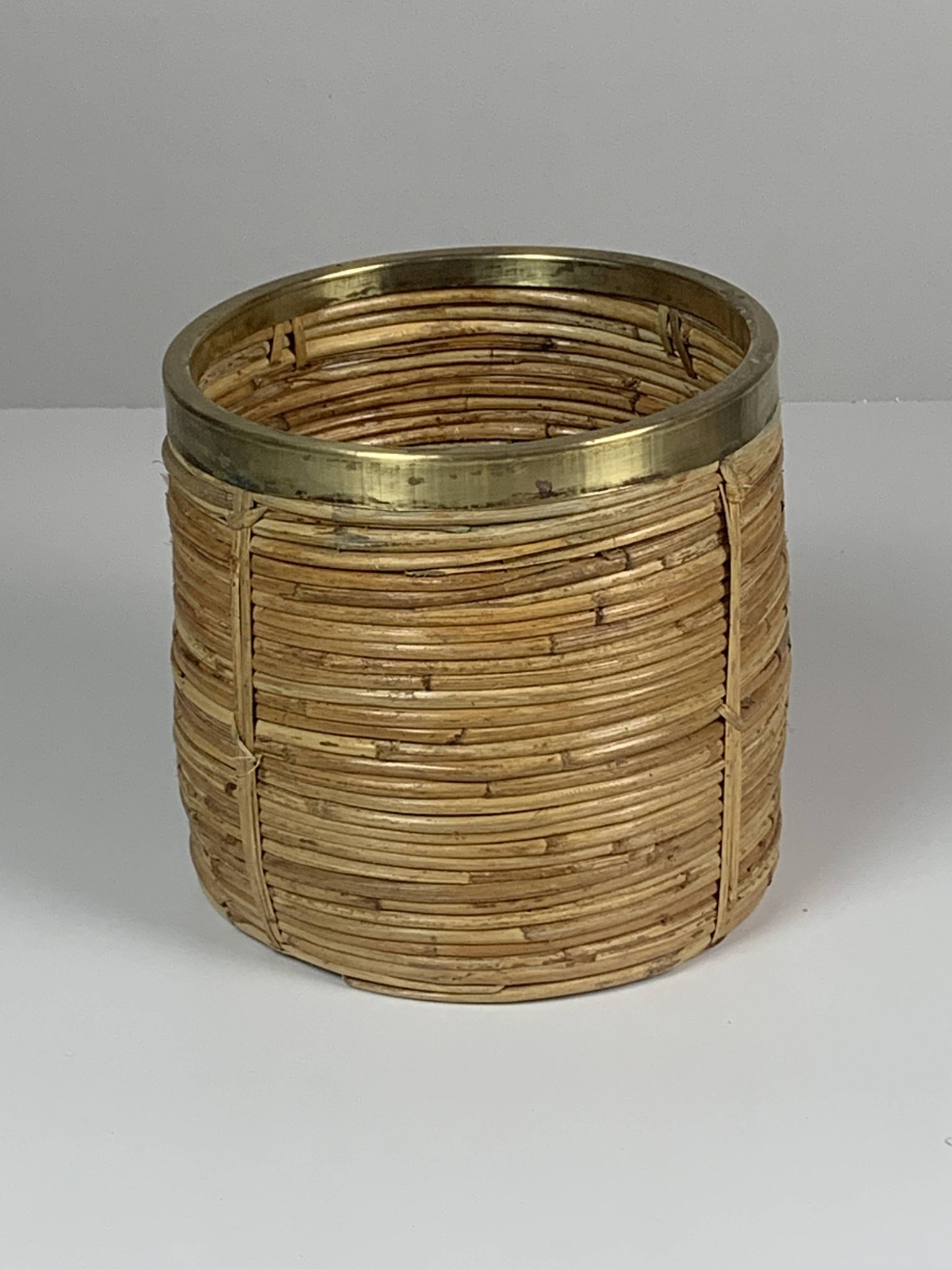 Set of 5 rattan pencil reed and brass plant holder baskets, Italy 1970s