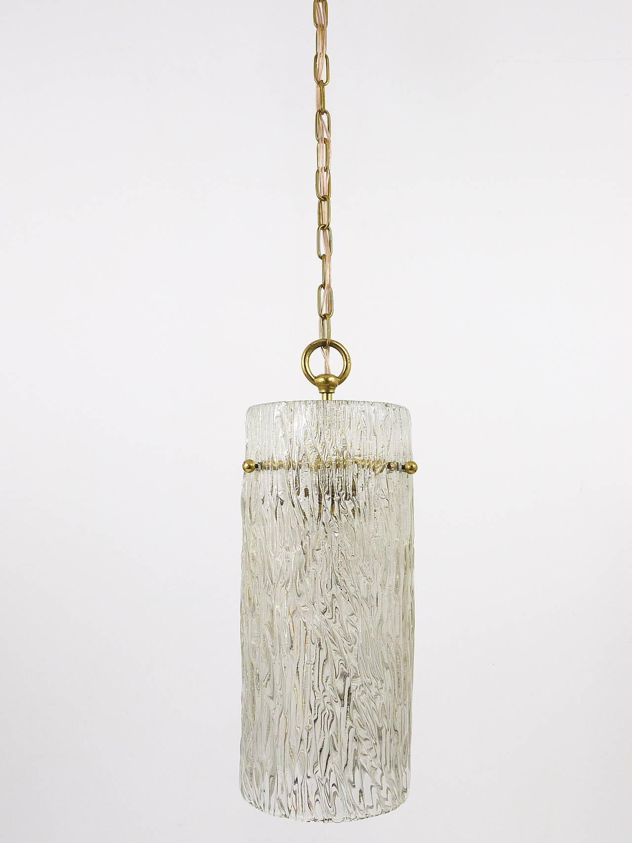 Two suspended lamps in glass and brass by J.T. Kalmar, Vienna, mid-century, Austria, 1950s.