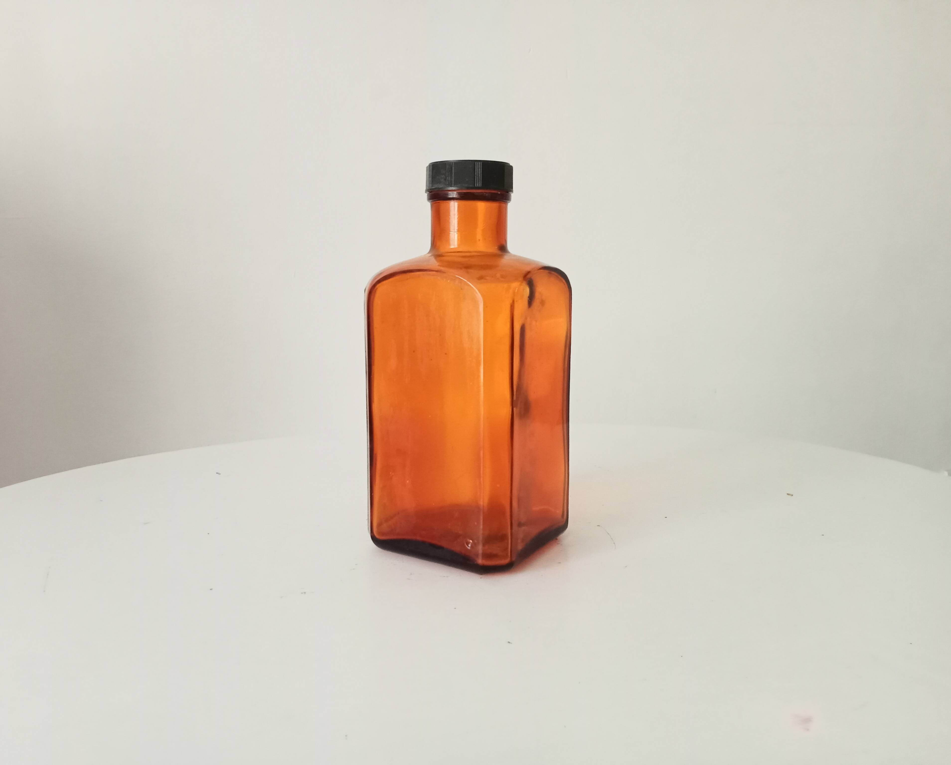 Old amber pharmacy bottle