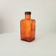 Old amber pharmacy bottle