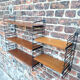 Vintage wood and metal shelves, designer storage.