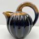 Pitcher Vintage jug in brown and blue ceramic in the shape of a melon