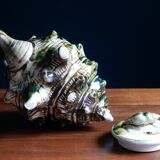 Individual teapot in the shape of a ceramic shell
