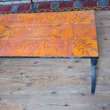 Wrought iron and orange ceramic coffee table