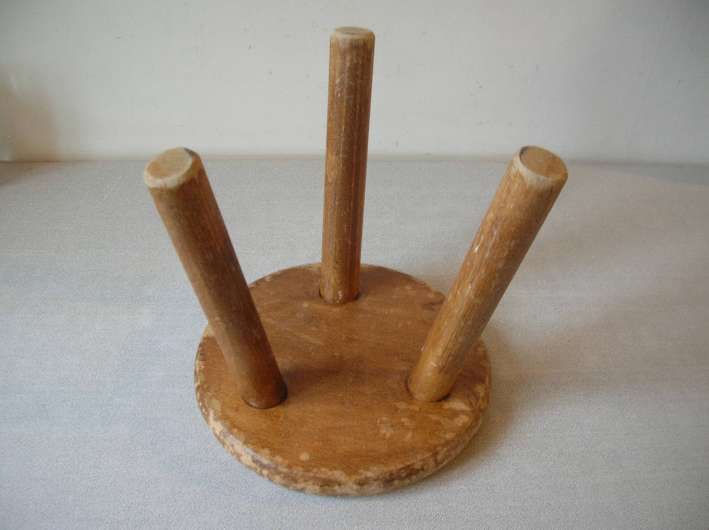 Old tripod stool with 3 wooden legs, painted floral decoration, flower bouquet