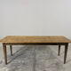 Old farmhouse table with tapered legs, late 19th to early 20th century.