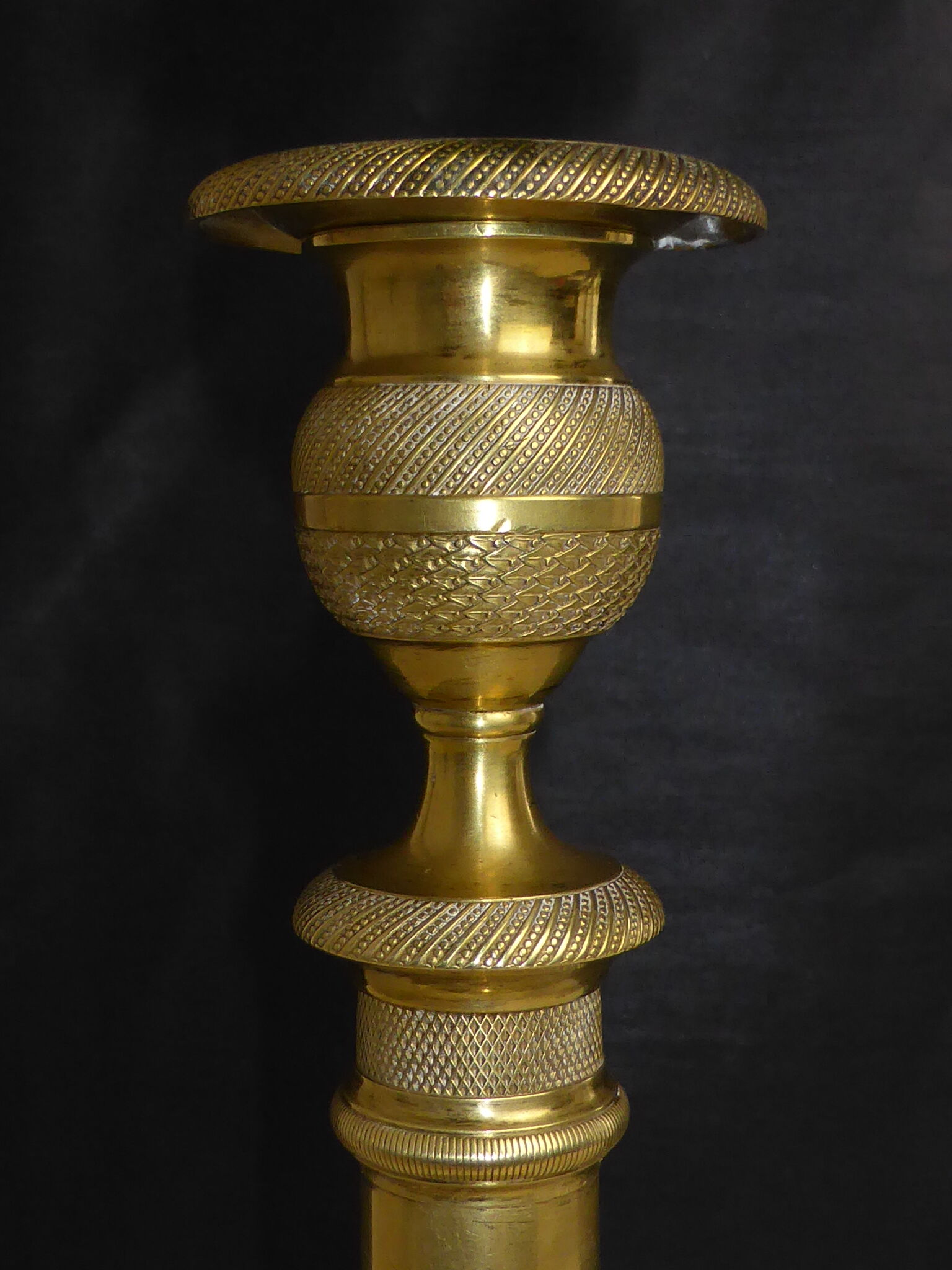 Torch old candle holder in chiseled brass base chiseled with roses