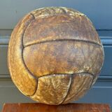 Mid-20th century leather soccer ball with visible stitching and beautiful patina
