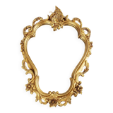 Baroque mirror in golden resin
