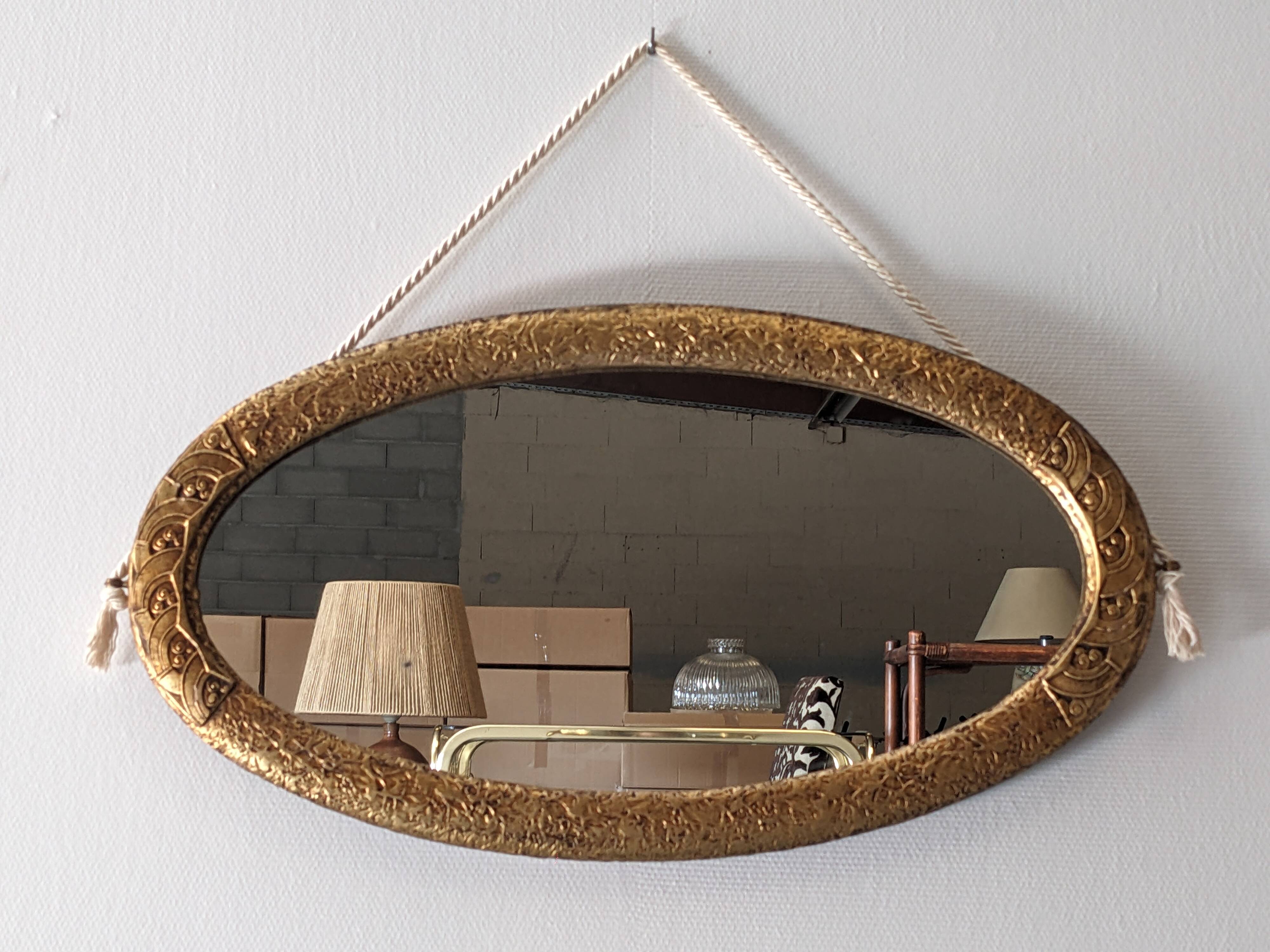 Miroir ovale Art déco en bois doré vers 1920