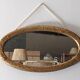 Miroir ovale Art déco en bois doré vers 1920