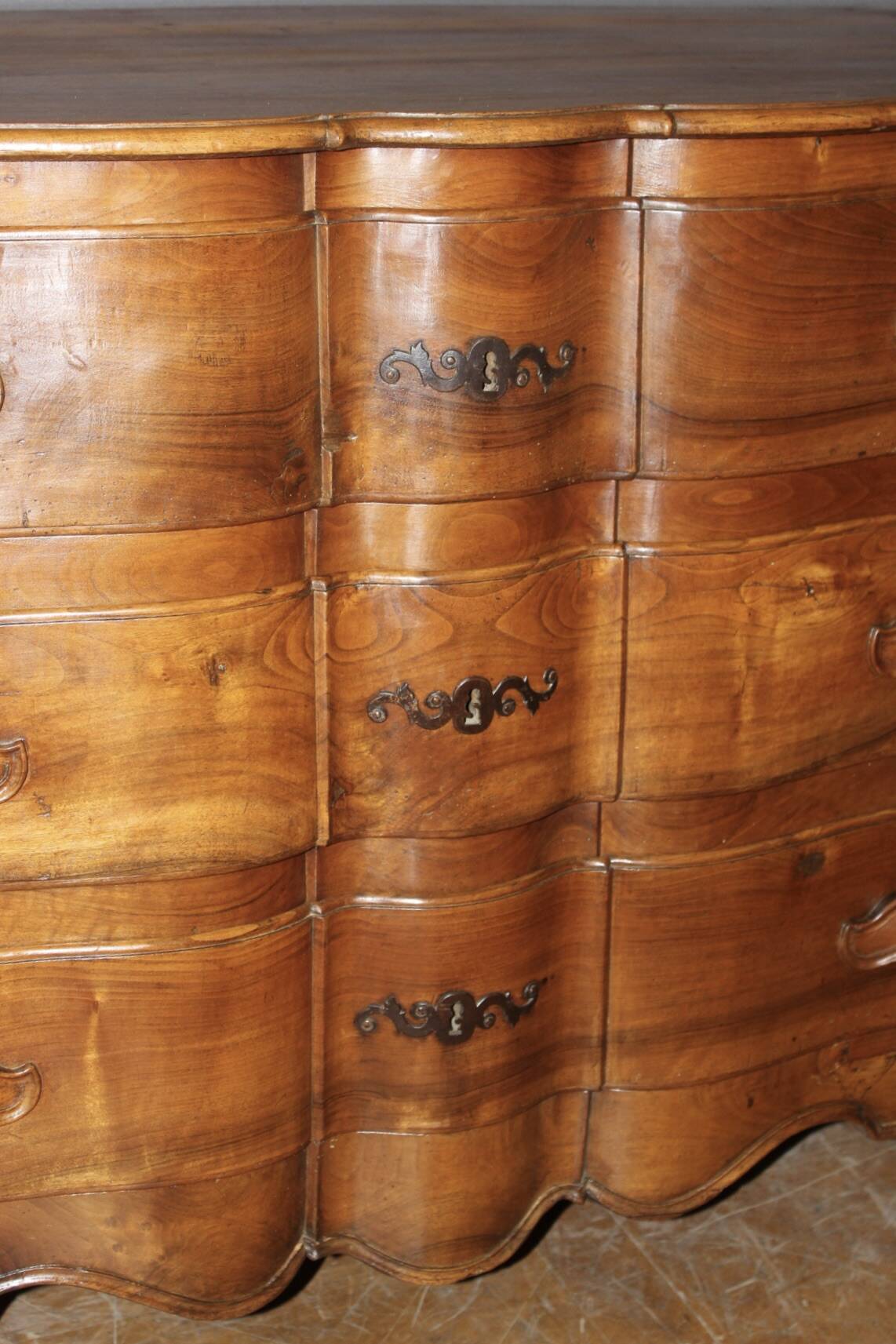 Eighteenth-century walnut crossbow commode.