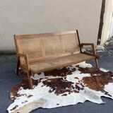 caned teak bench