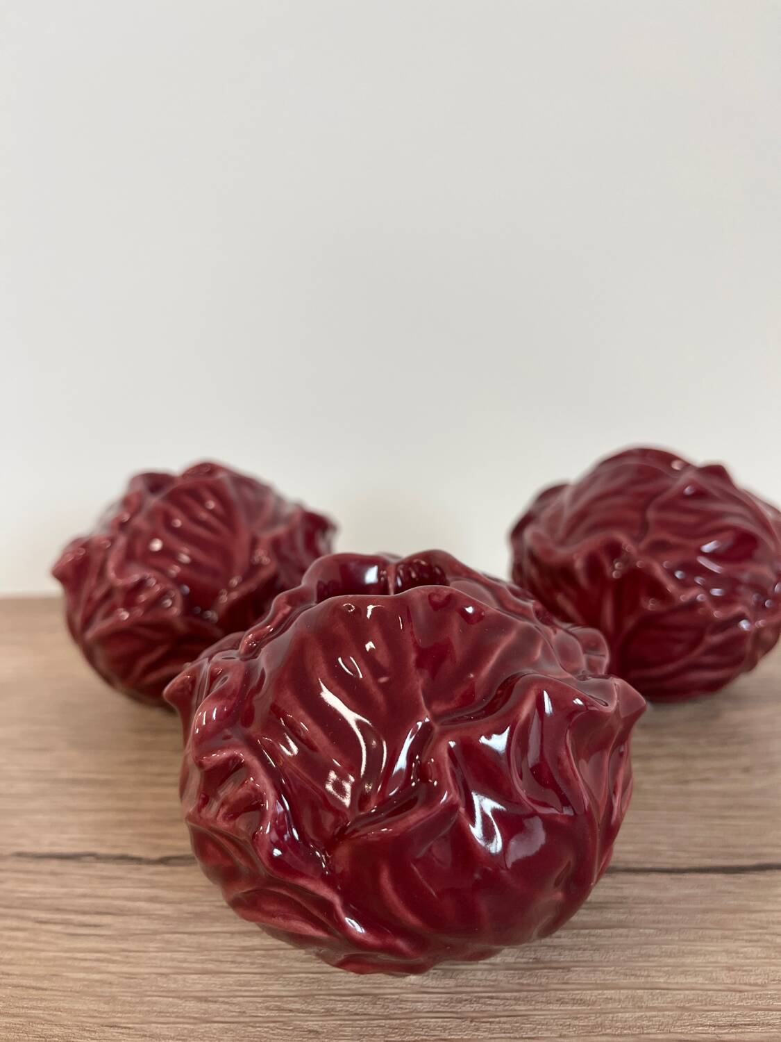 Cabbage-shaped slipware candlesticks, set of 3