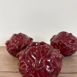 Cabbage-shaped slipware candlesticks, set of 3