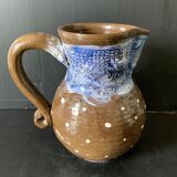 Brown enamelled ceramic pitcher with polka dots