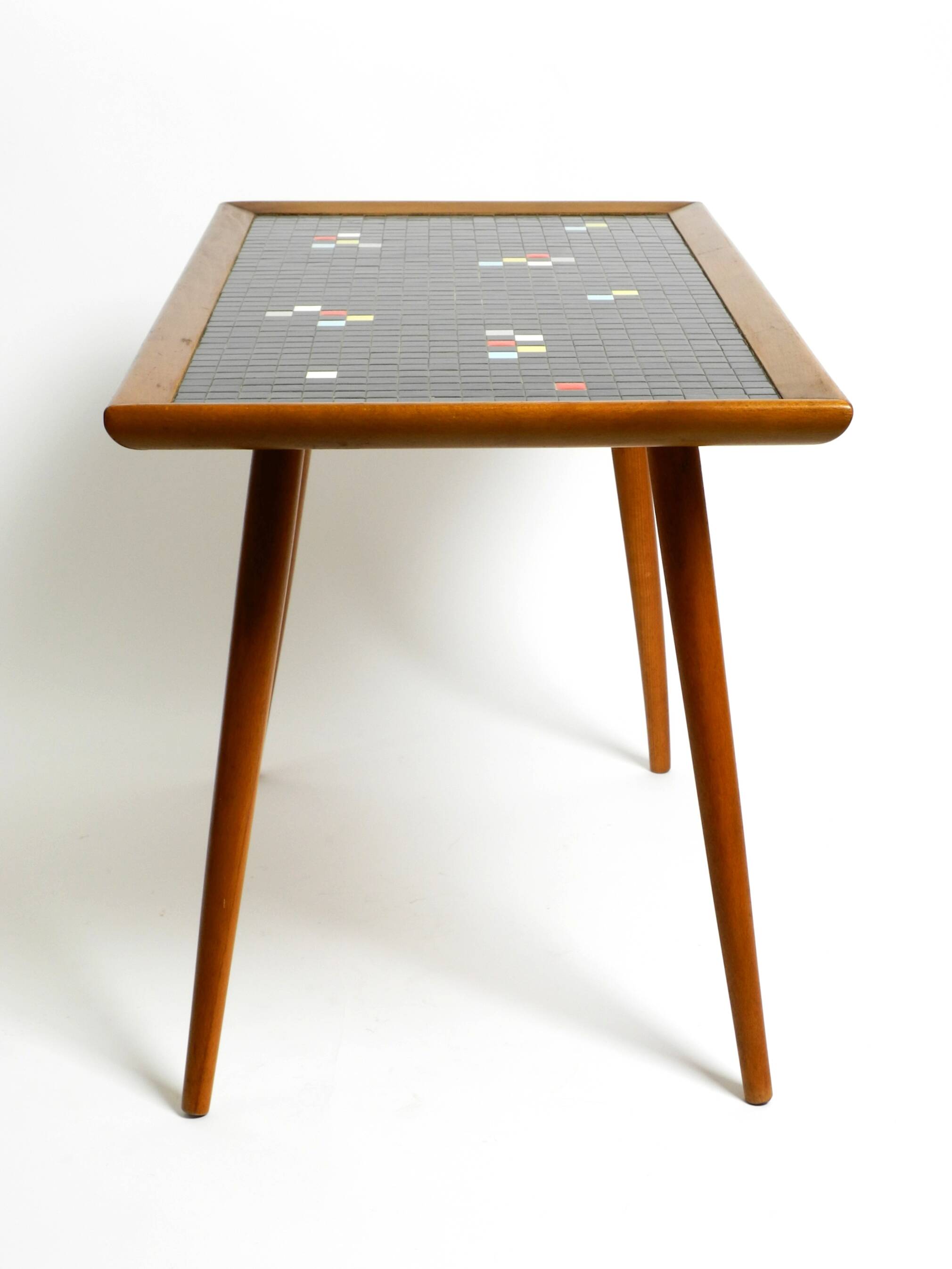 Beautiful long Mid Century walnut wood coffee table with a mosaic surface