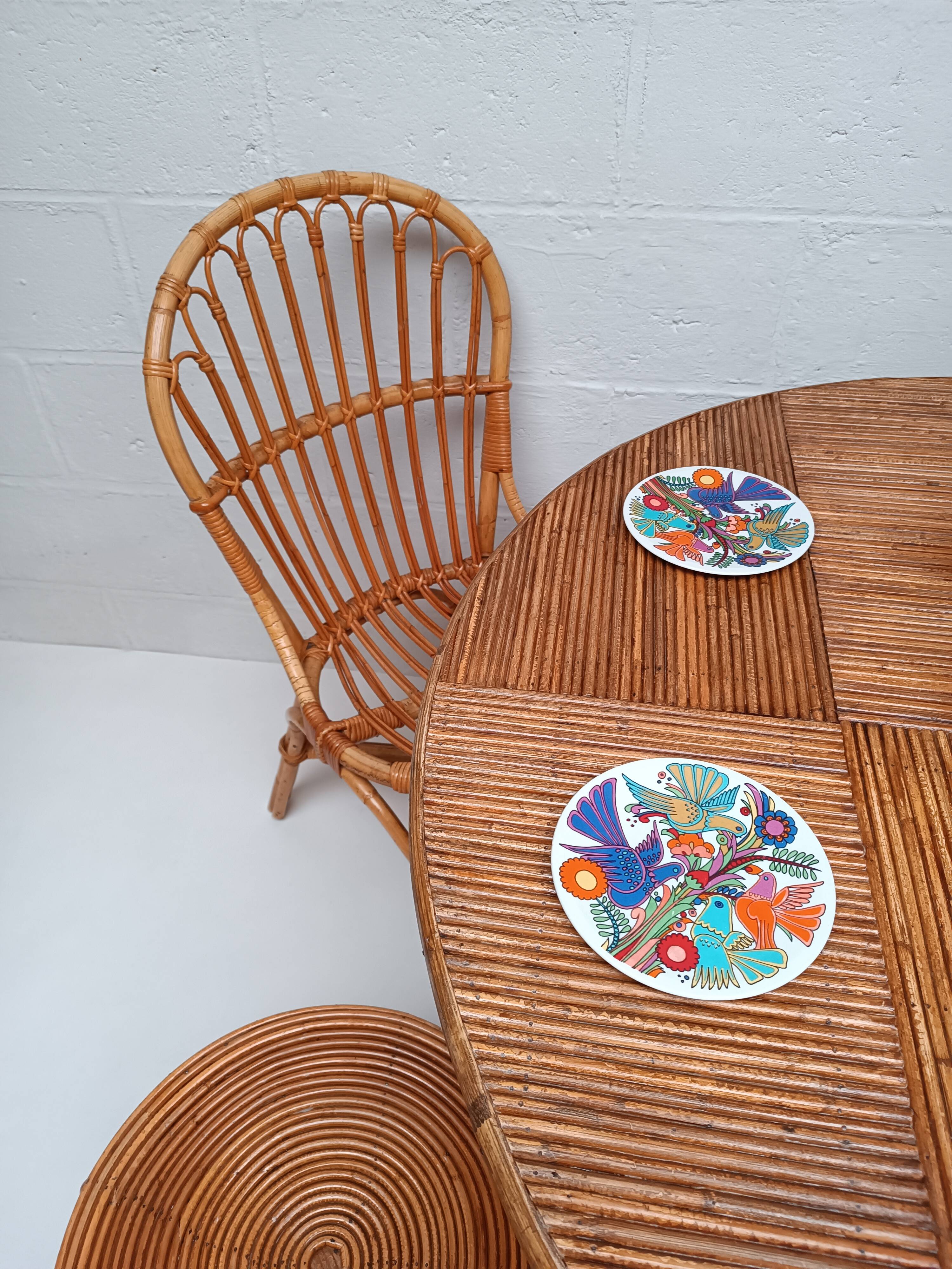Bamboo table with extensions, 3 chairs and 3 stools from the 1960s.