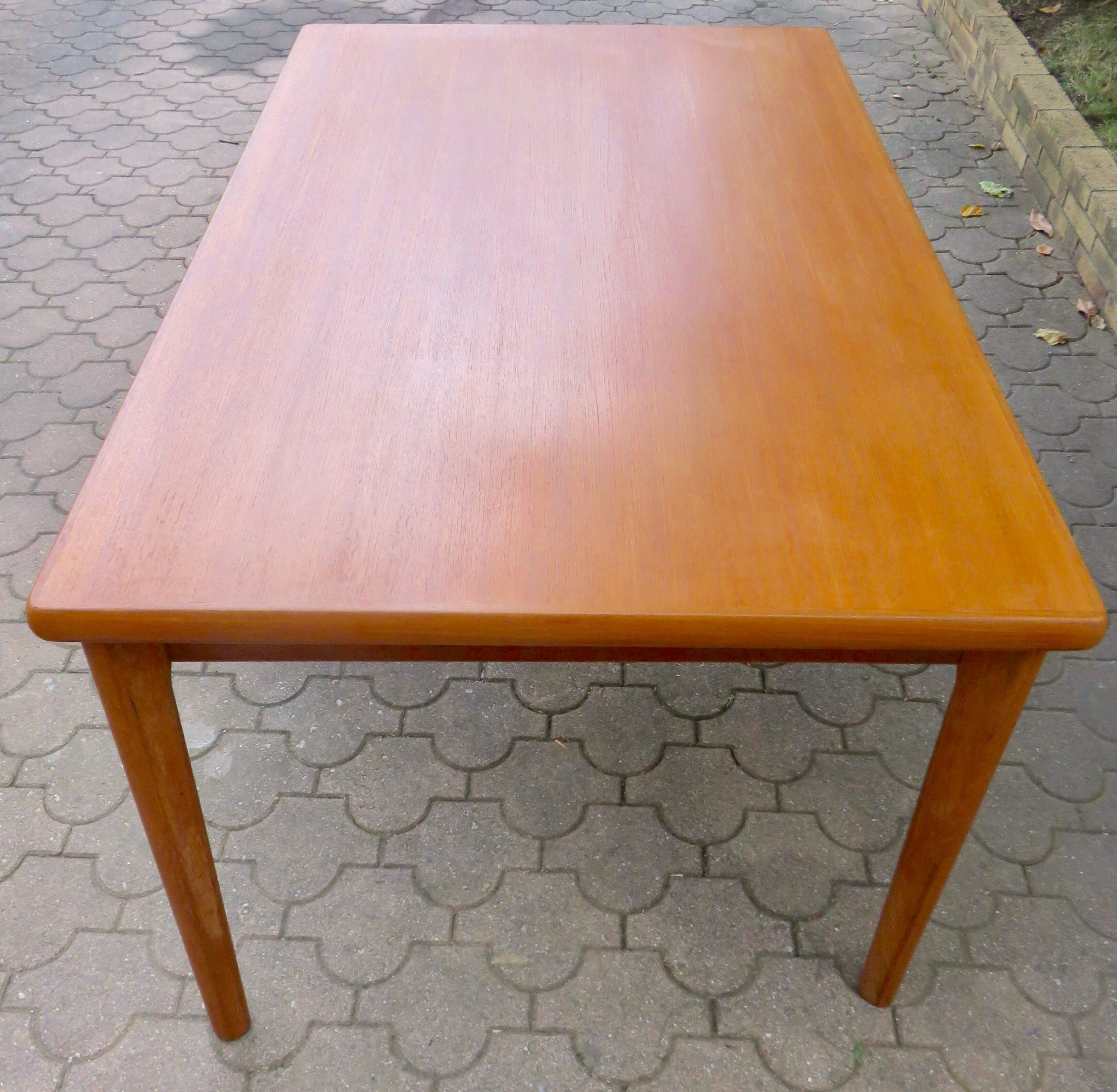 Extendable teak table by Henning Kjaernulf, Denmark 1960