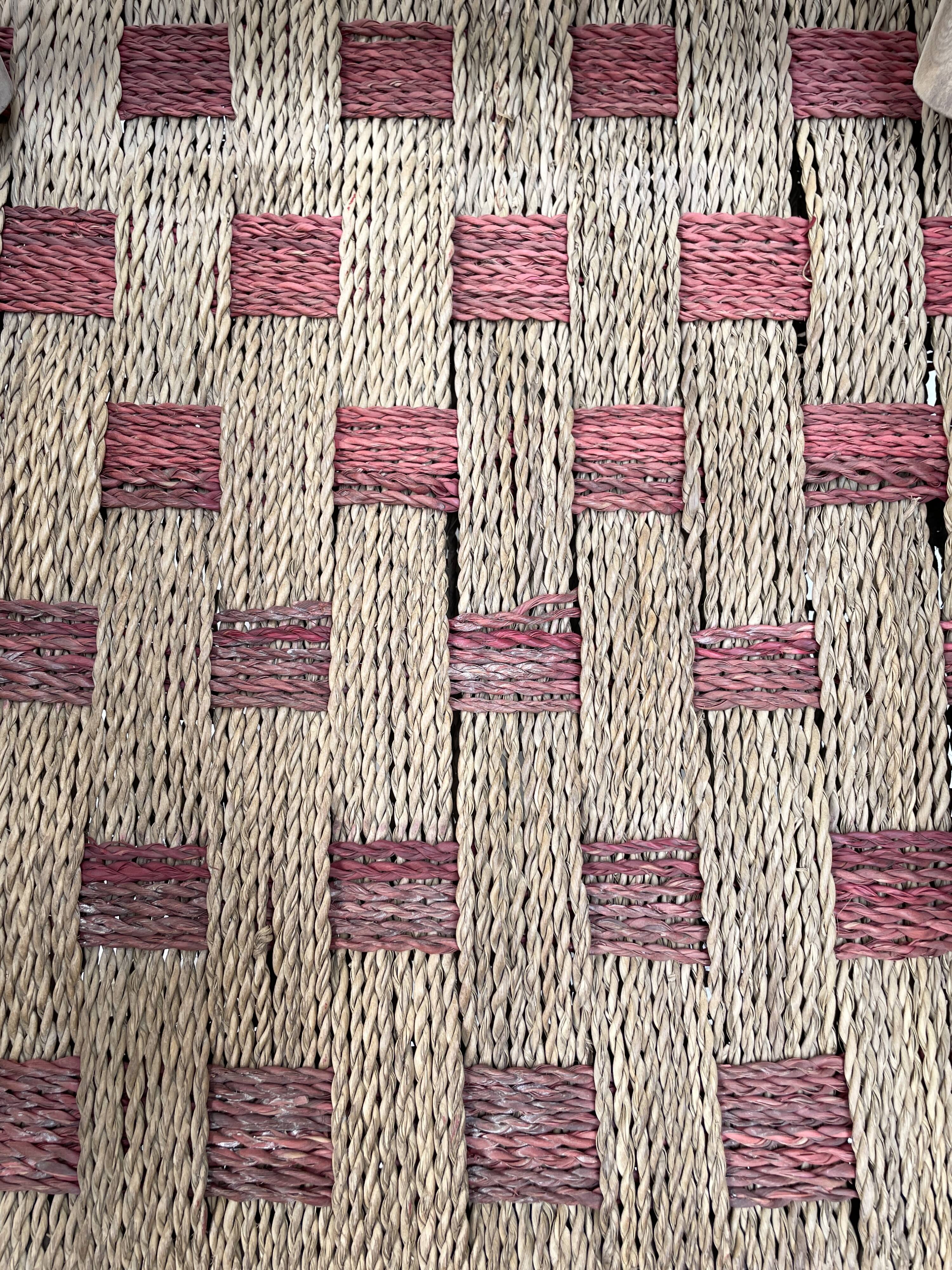 Pair of wooden armchairs and ropes