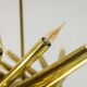 Pair of 24-light patinated brass chandeliers. 1980s.