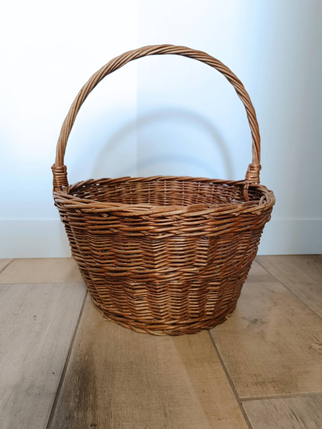 Large round vintage wicker basket