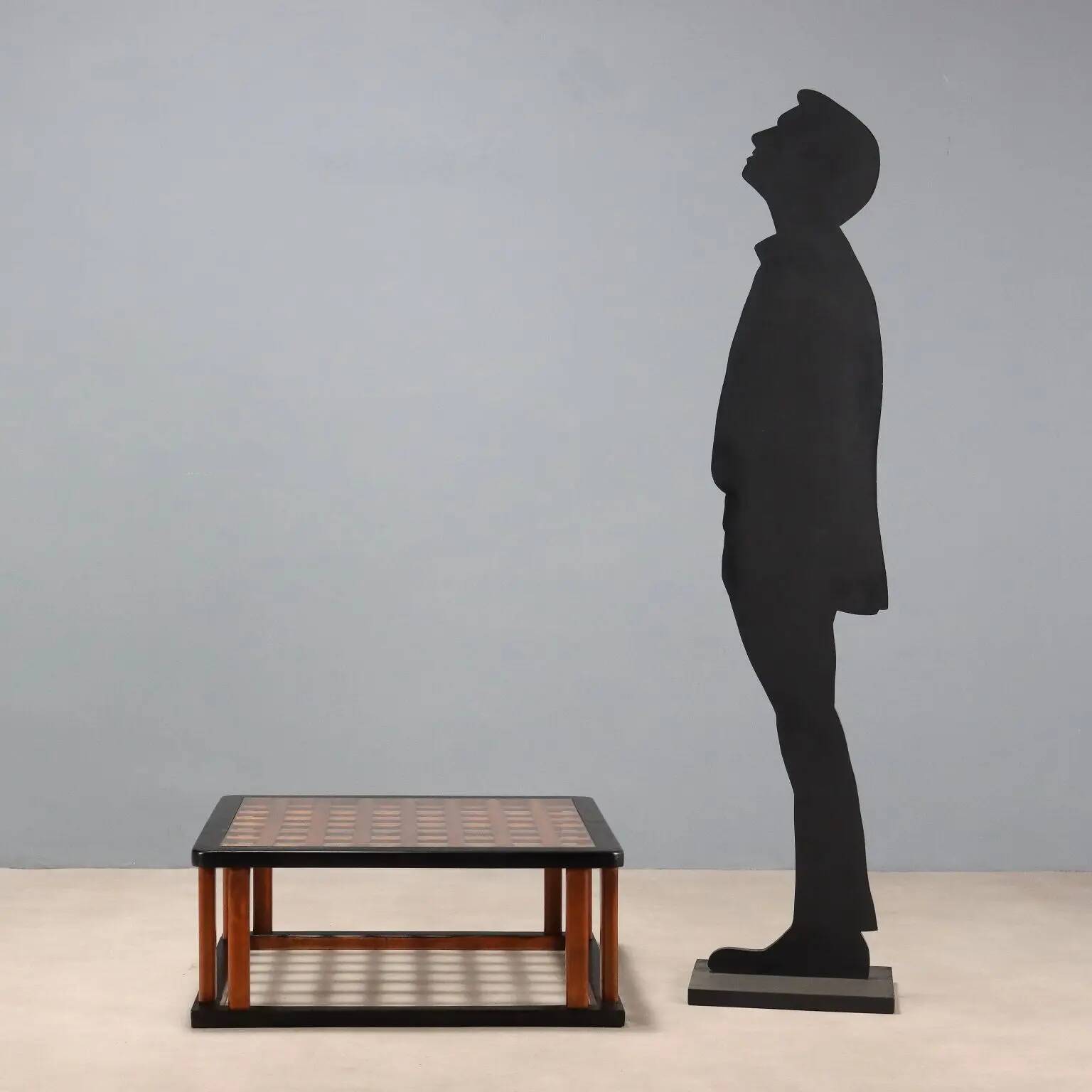 Vintage wooden coffee table with paint and glass, design from the 1940s-50s.