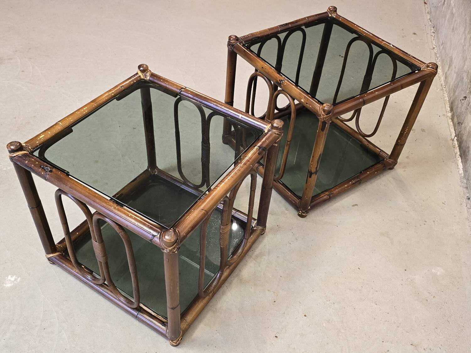 Two rattan and smoked glass tables, 1970