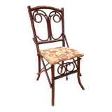 Folk art chair, black forest in branches