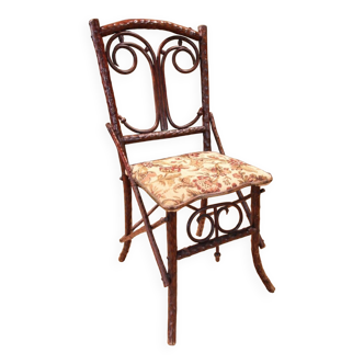 Folk art chair, black forest in branches