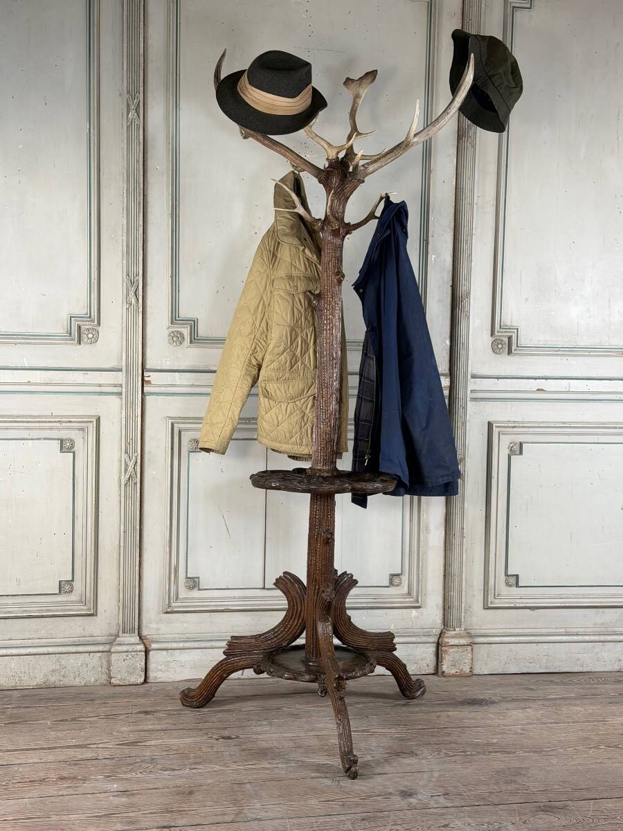 Carved wooden coat rack from the Black Forest, circa 1900.