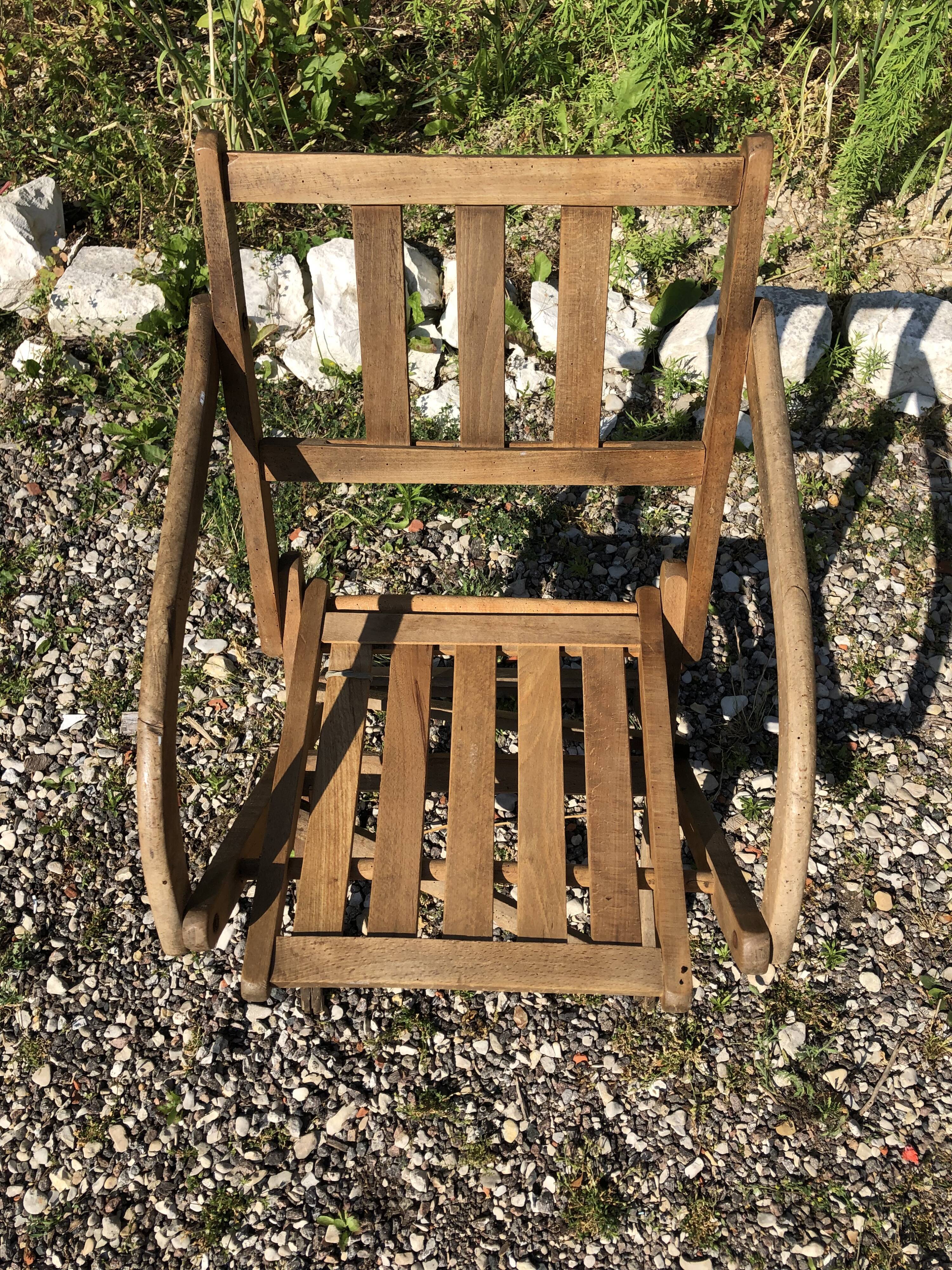 Old folding armchair wooden sitting vintage