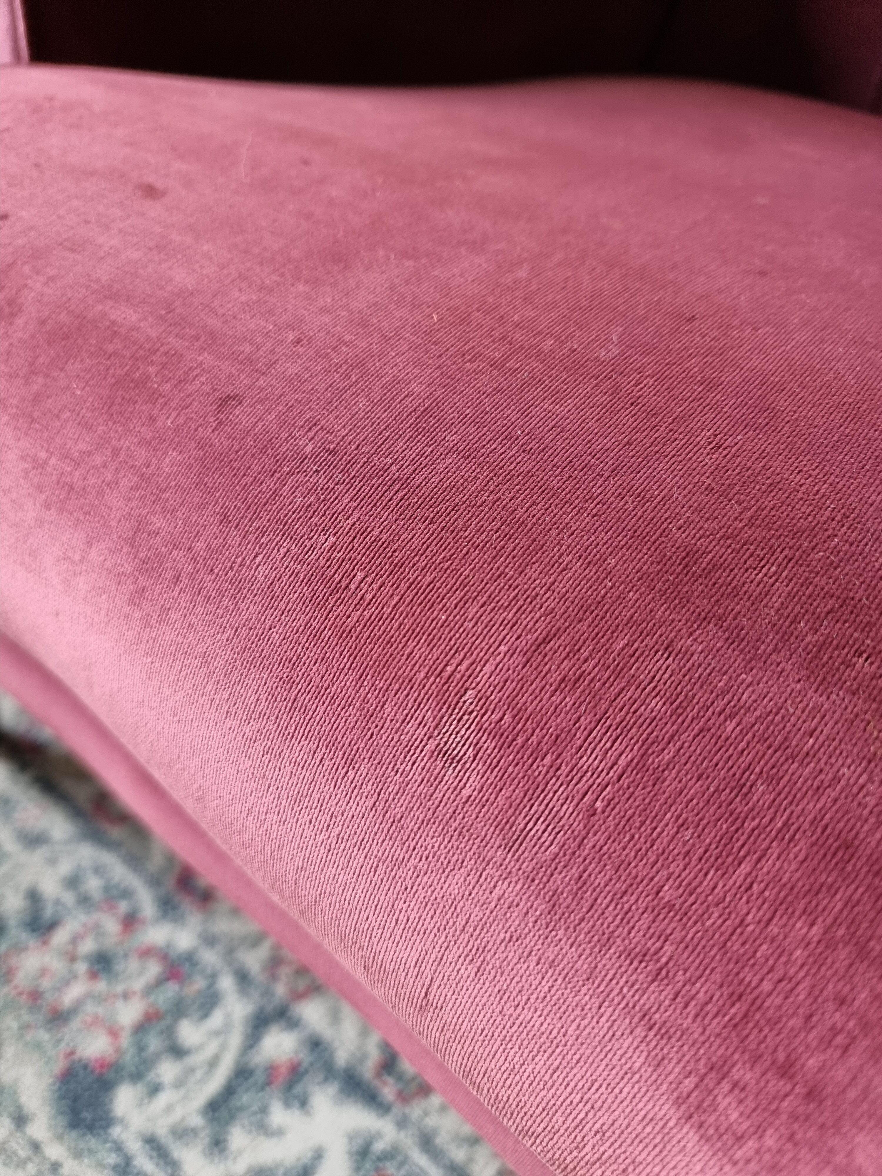 Upholstered velvet armchair