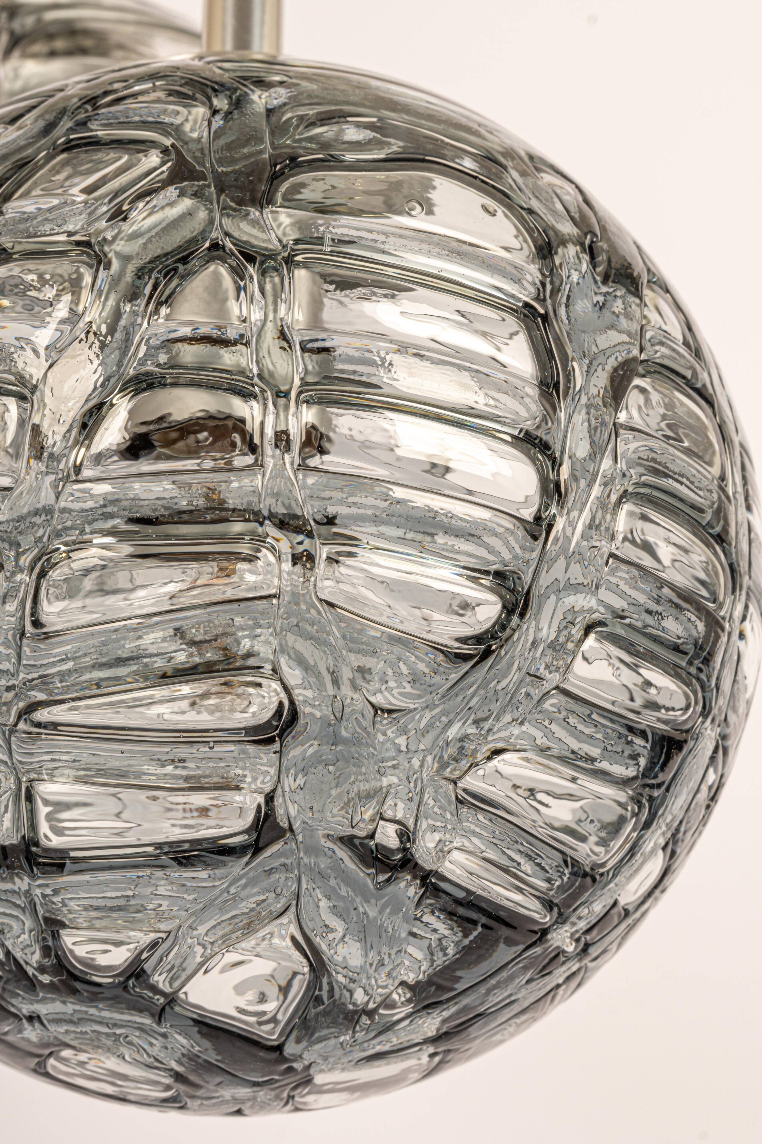 Grand cascading chandelier design with Murano glass by Doria, Germany, 1970s.