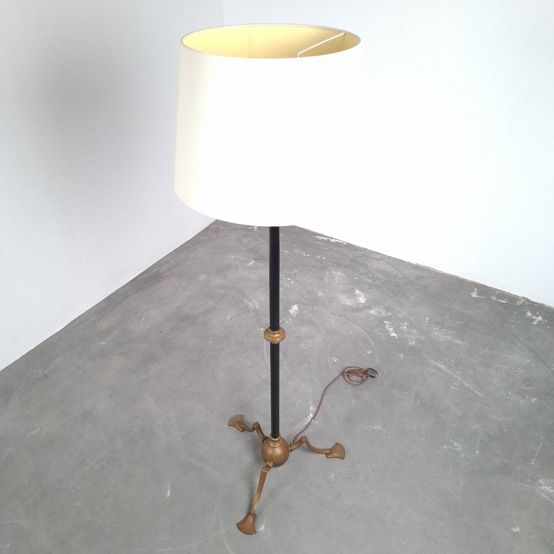 Art and Craft tripod floor lamp in bronze.