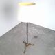 Art and Craft tripod floor lamp in bronze.
