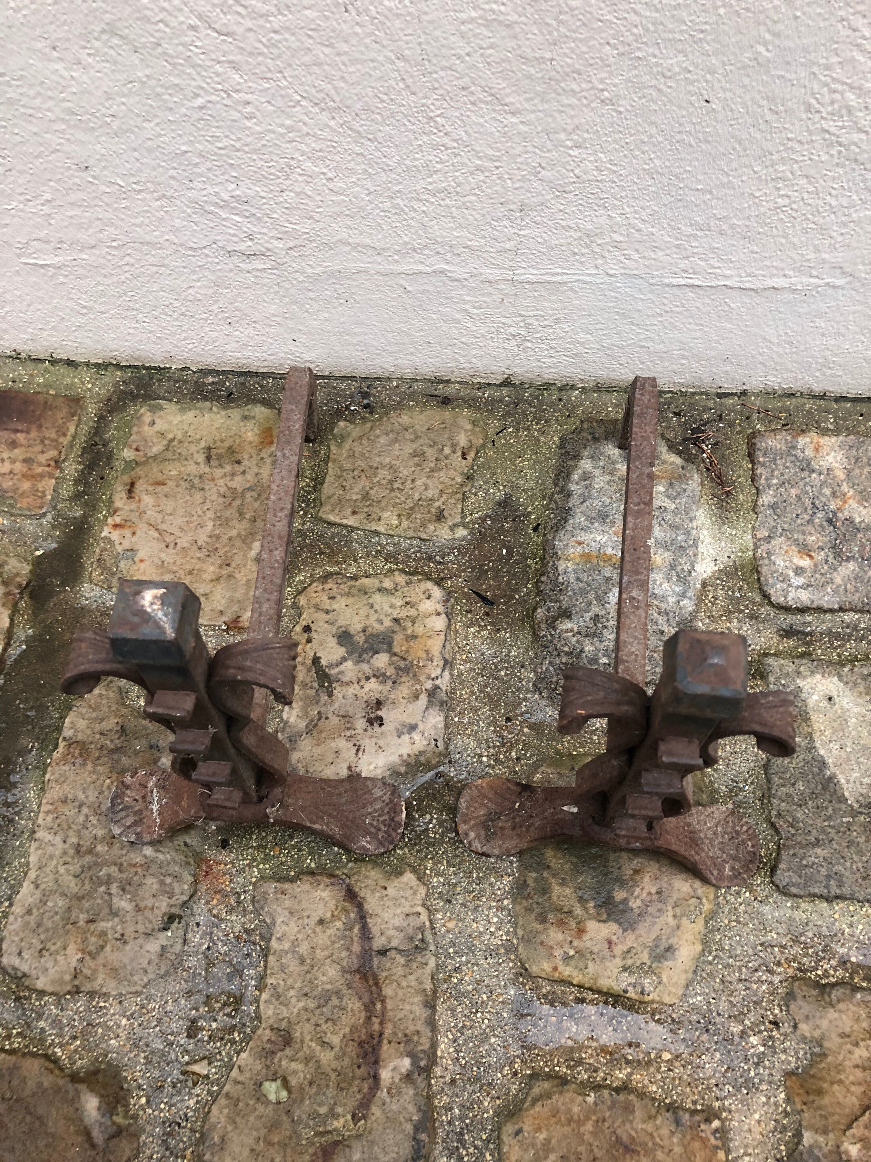Pair of wrought iron chimney pegs