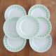 Set of 7 Badonviller flat plates, trellis decor
