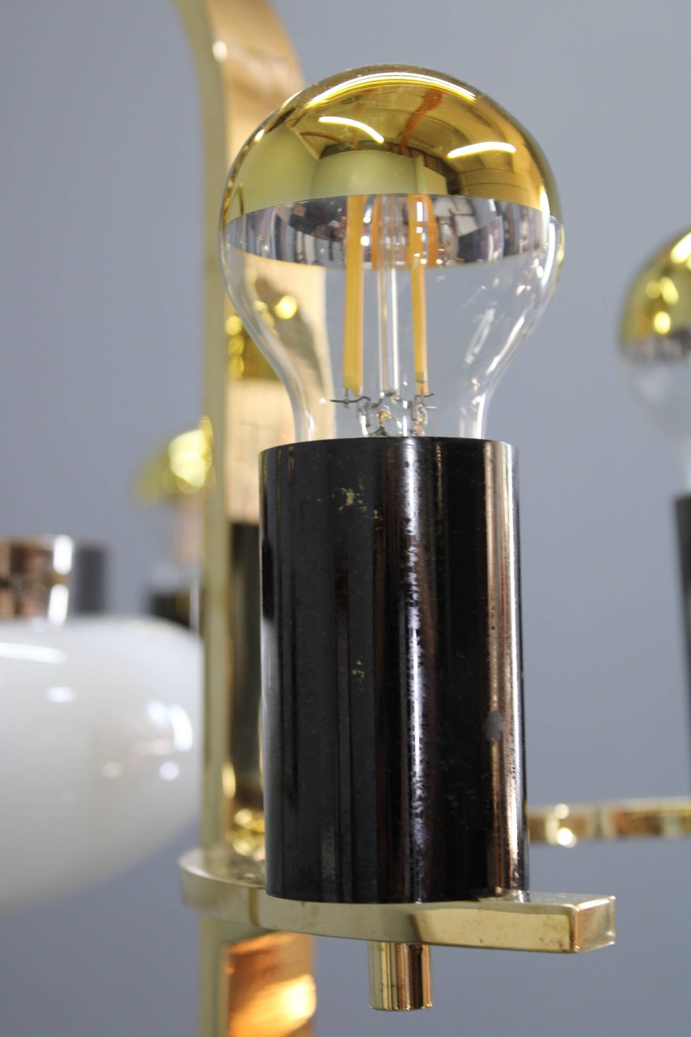 1930s Czech Art Deco brass chandelier with milk glass center and exposed bulbs