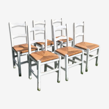 6 white wooden chairs mulched seats