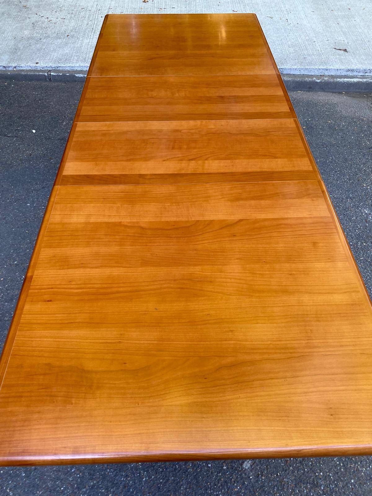 Scandinavian extendable dining table in honey-stained wood for 12 people 1990