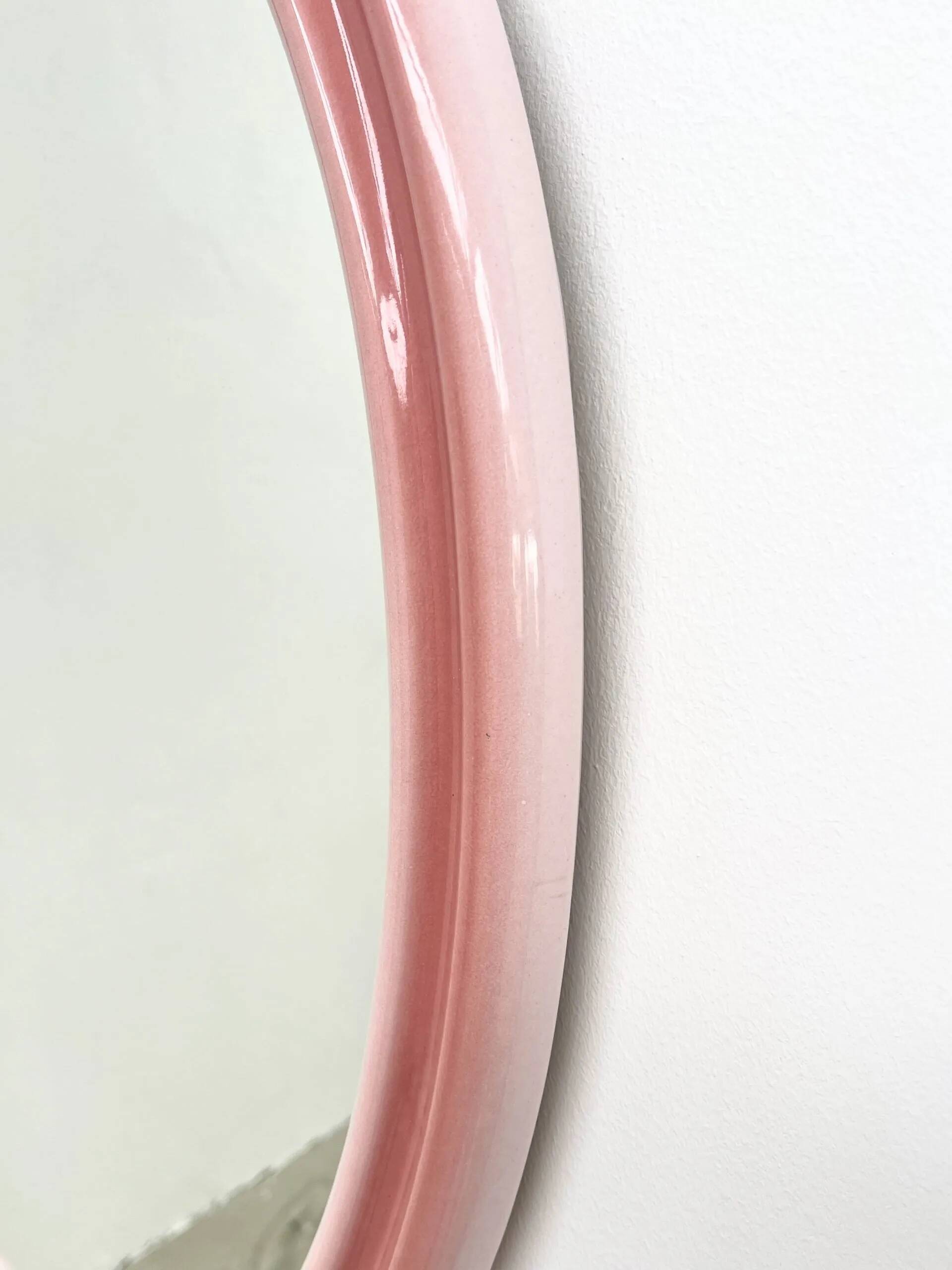 Large oval pink ceramic mirror (76cm) – vintage Italian design