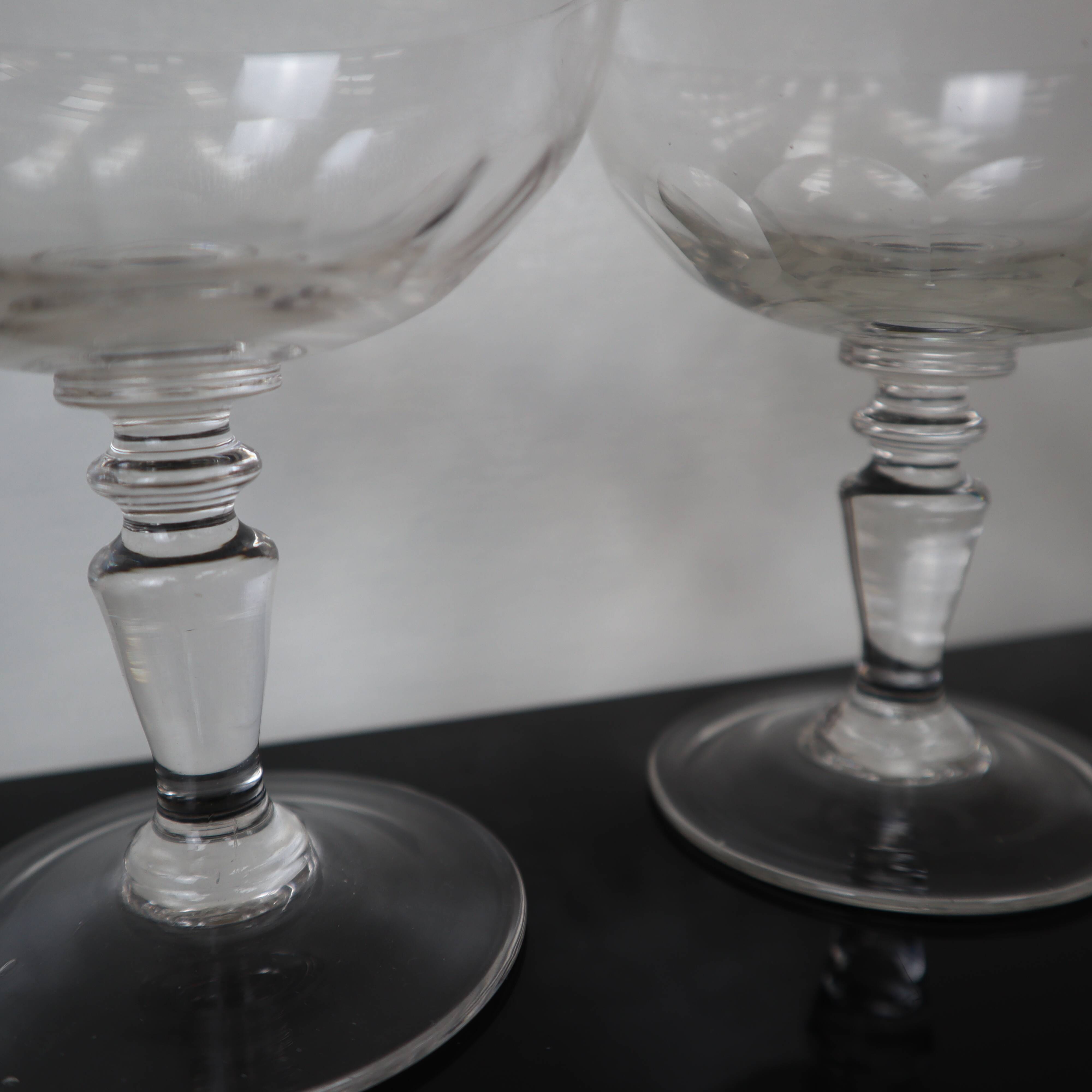 2 Antique faceted champagne glasses in blown glass