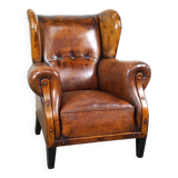 Irresistible old sheep leather wingback armchair with the most beautiful colors
