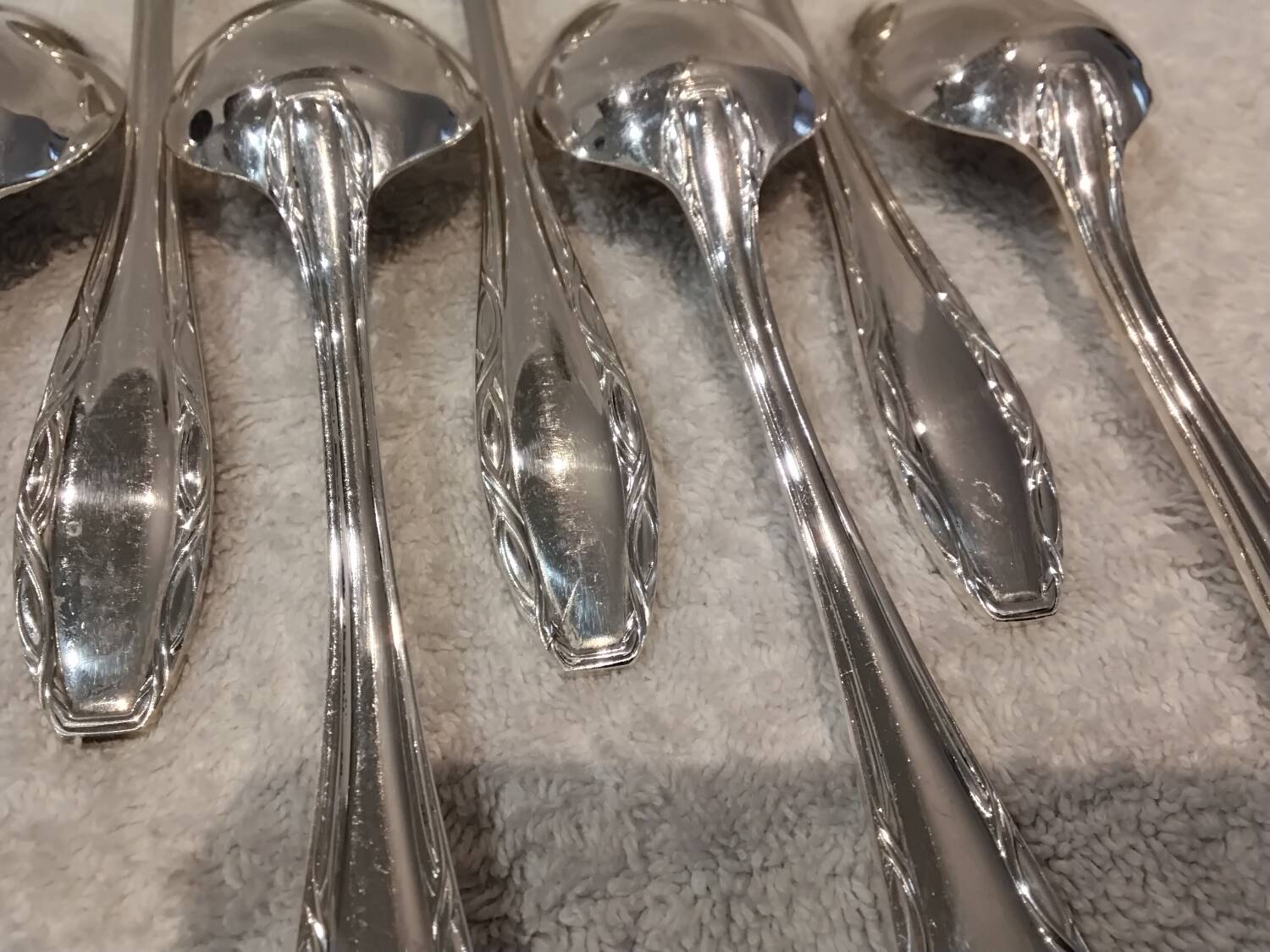 12 silver plated dessert spoons, Argental art deco goldsmith