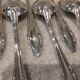 12 silver plated dessert spoons, Argental art deco goldsmith