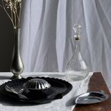 Pair of vintage black glass shell dishes D32 and D26