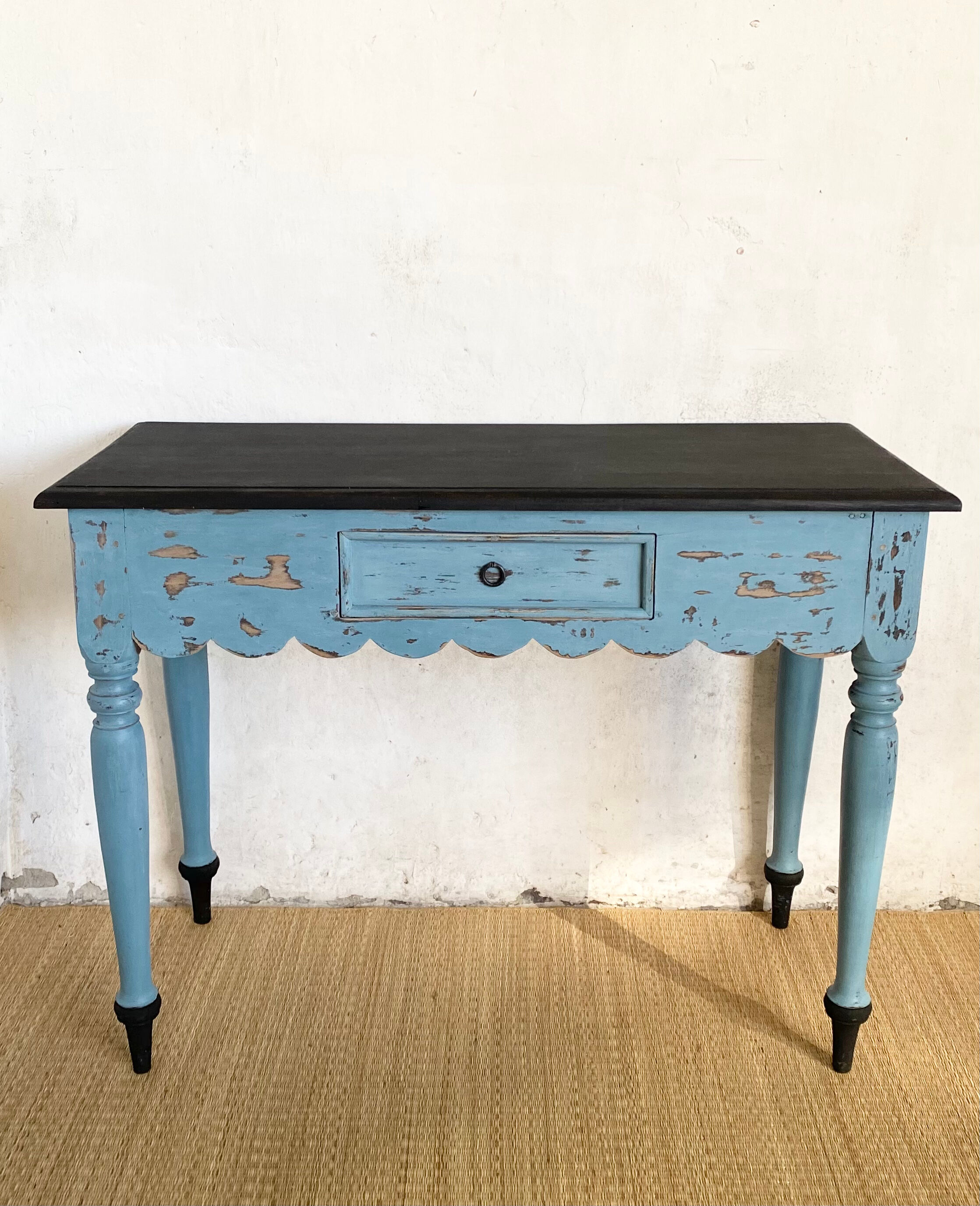 Scalloped console table